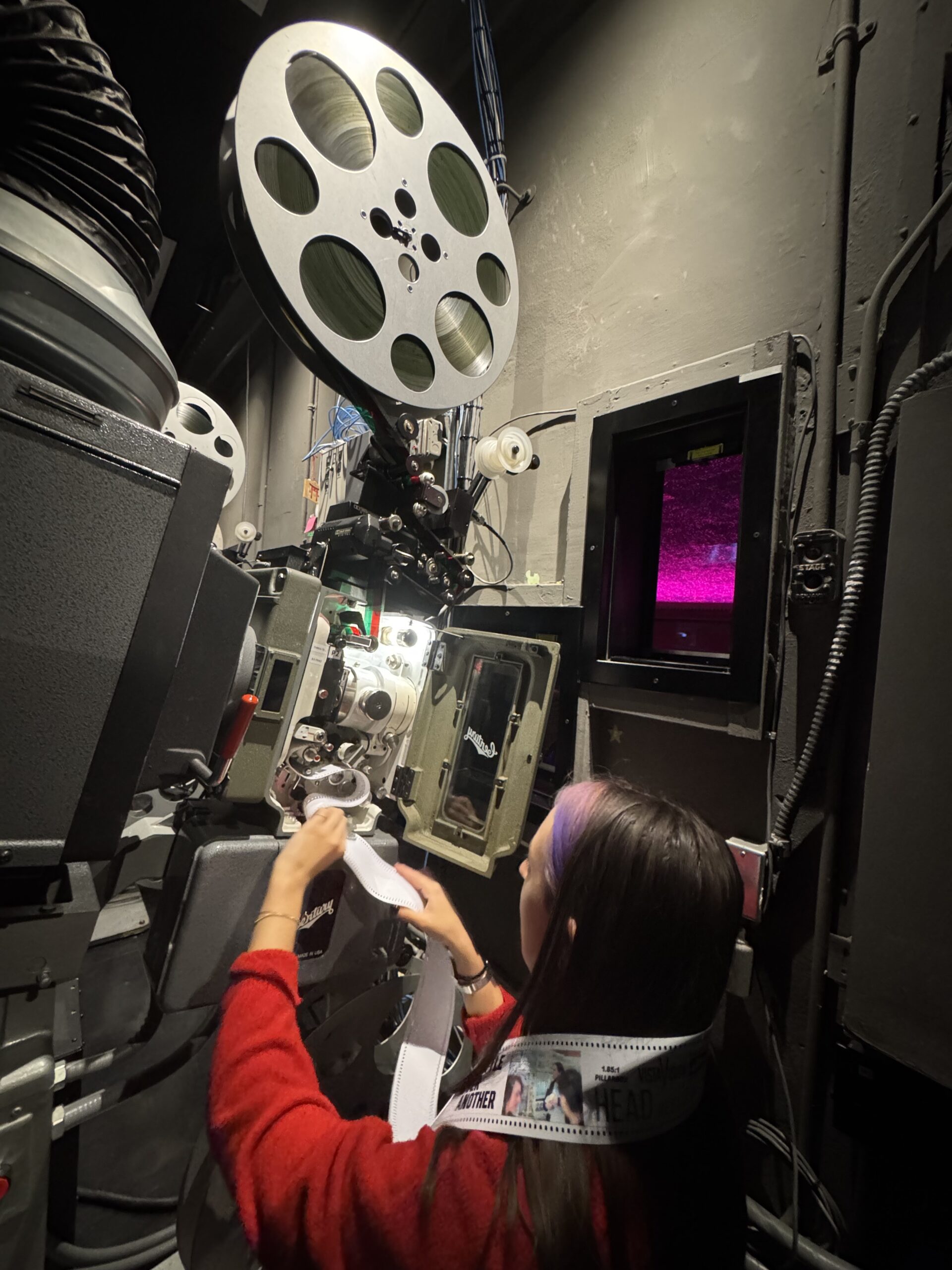 Kelsey Parks at projector Photo by Jolee Mallmann