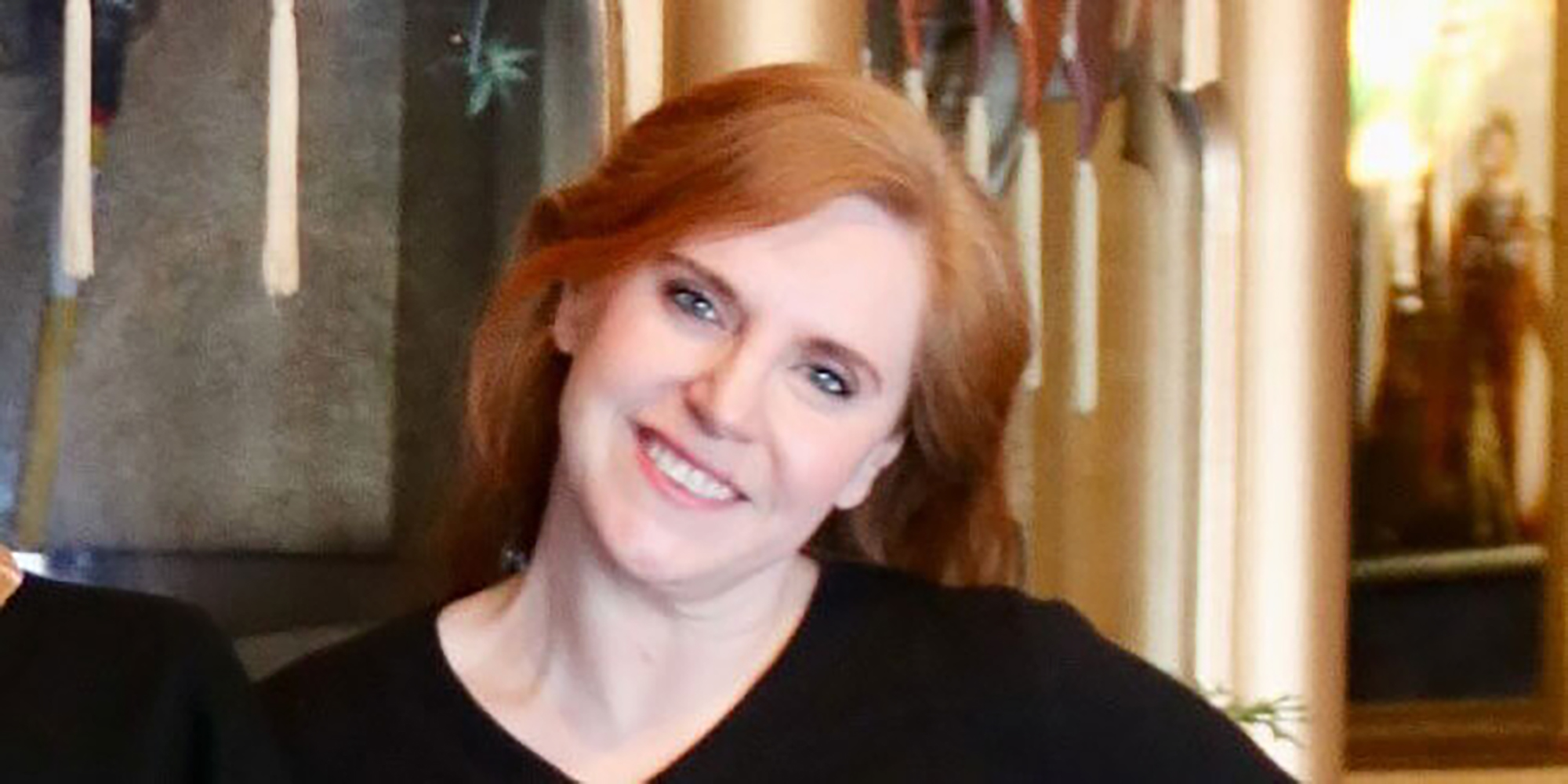 Milwaukee Film Operations Director Kristen Heller standing in the lobby of the Oriental Theatre. Photo by Jolee Mallmann