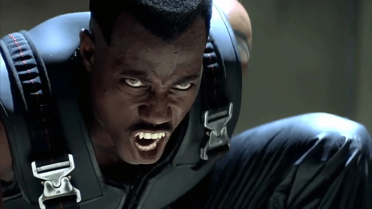 Blade Film still. A super badass Black Vampire with fangs.