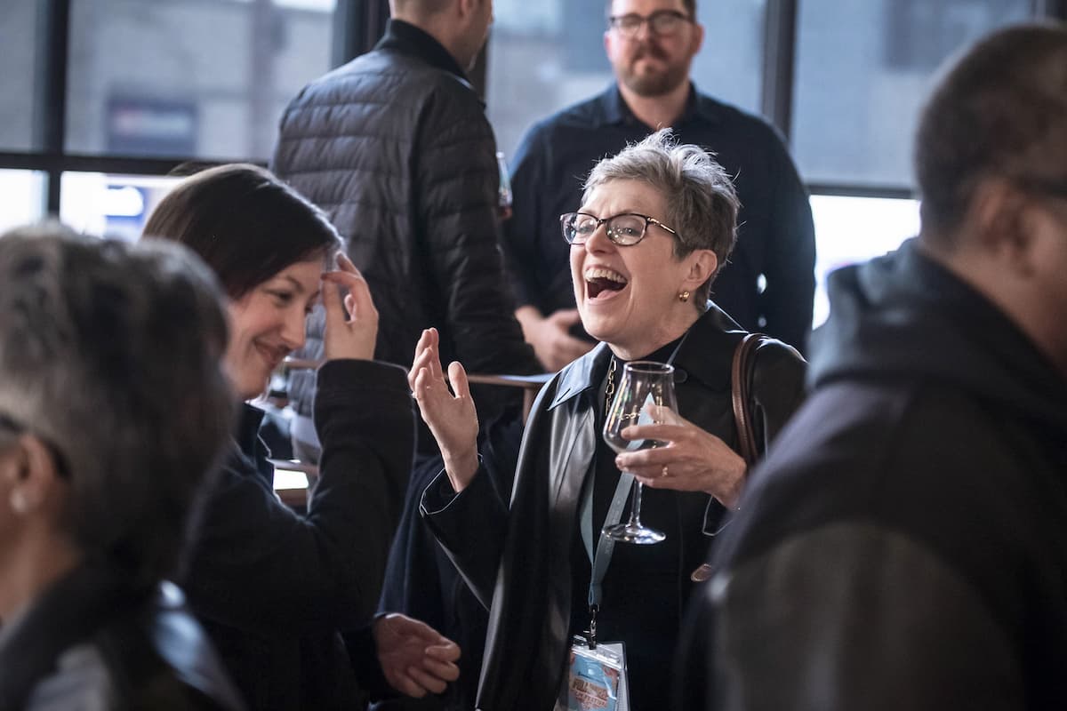 A photo of happy people at a mixer at the Milwaukee Film Festival