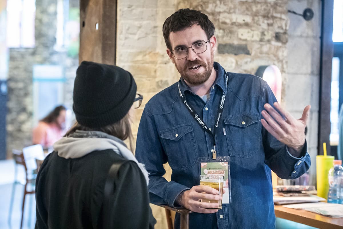 A photo of happy people at a mixer at the Milwaukee Film Festival