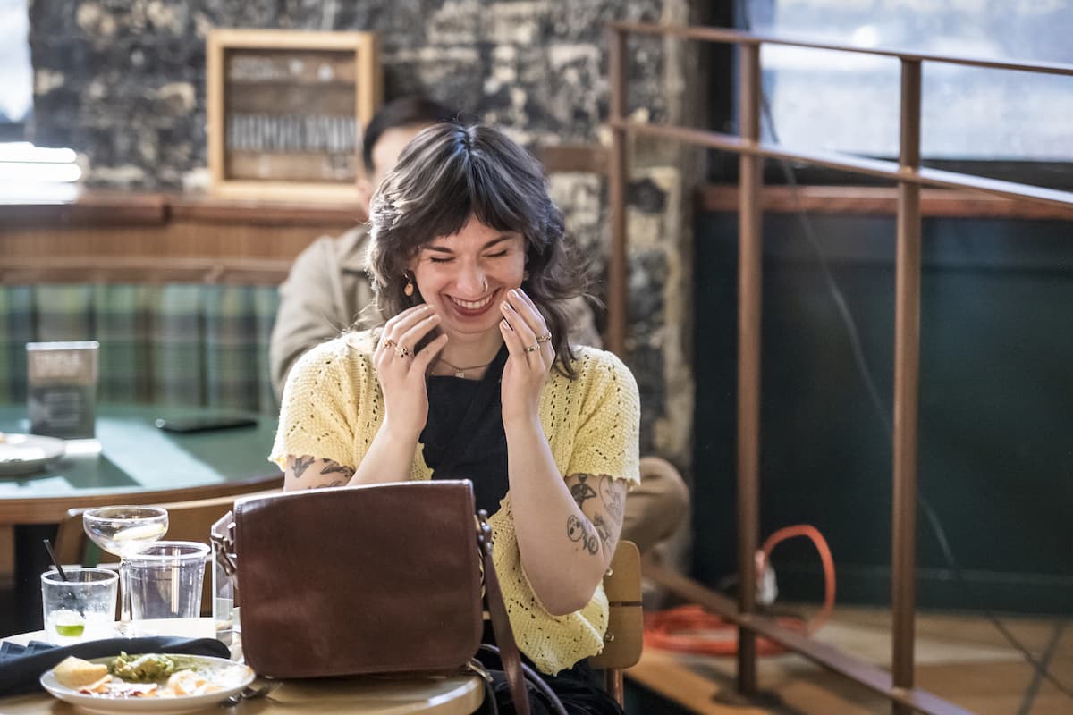 A photo of an award winner looking happy