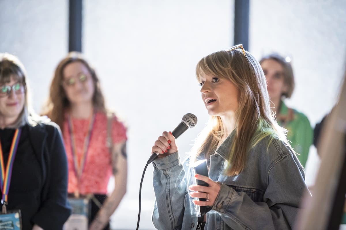A photo of an award winner giving a speech