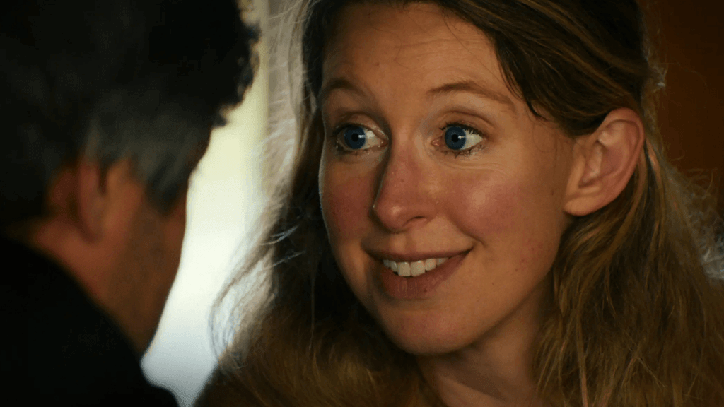 You Can See Everything Film Still Elizabeth Holmes stares hauntingly into Nathan Feilder's eyes